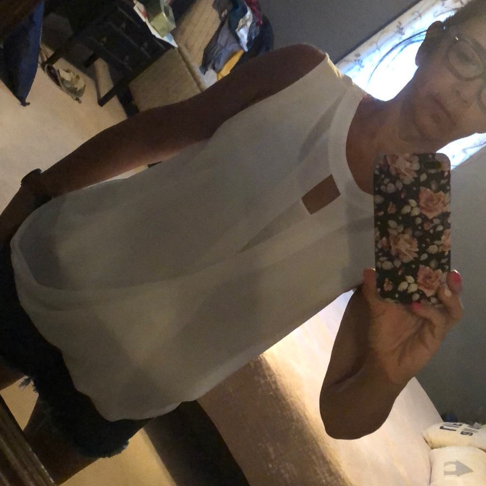 Beautiful white slowly shirt with back neck tie